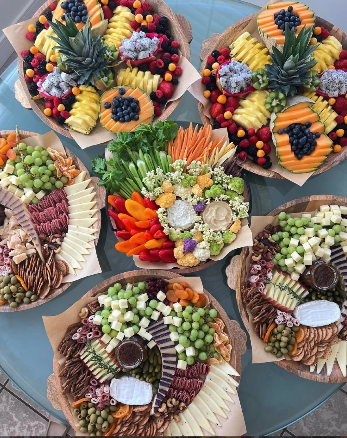 Cluster of cheese and charcuterie boards