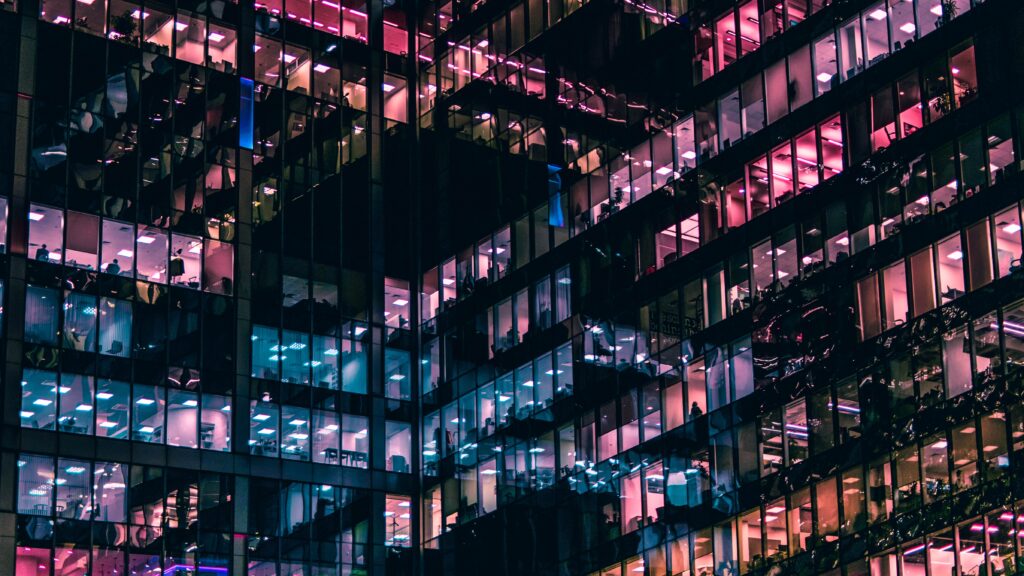 Office Building with reflective lighting at night