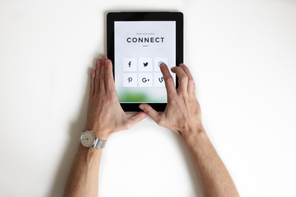 a tablet showing multichannel marketing platforms